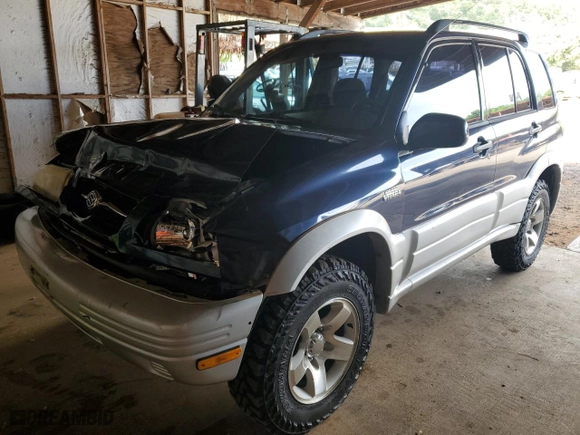 2000 Suzuki Grand Vitara JLX with VIN JS3TD62VXY4110167, listed as a Copart auction lot 77887674 with 126,214 mi miles and Salvage Title. Bid and sale history available at carsss.com. Image 1.
