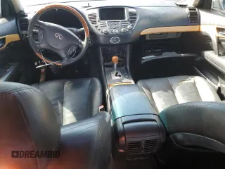 2003 Infiniti Q45 z VIN JNKBF01AX3M103002, wystawiony jako Copart lot #47860175 z przebiegiem 317 912 mil mil oraz Tytuł czysty. Historia ofert i sprzedaży dostępna na DreamBid. Obrazek 8.