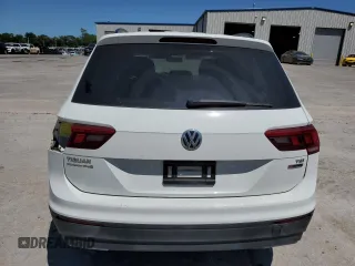 2018 Volkswagen Tiguan S with VIN 3VV0B7AX7JM065958, listed as a Copart auction lot 57598015 with 97,360 mi miles and Salvage title. Bid and sale history available at DreamBid. Image 6.
