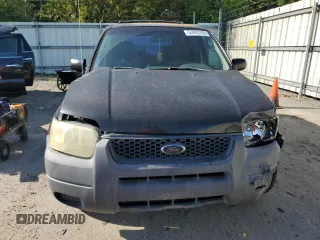 2004 Ford Escape XLS с VIN 1FMYU02194KB20656, выставлен на аукционе Copart как лот 54820755 с пробегом 107 447 миль миль и Списание • Salvage title. История ставок и продаж доступна на DreamBid. Изображение 5.