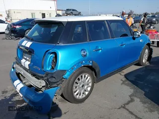 2015 MINI Hardtop 4 Door S with VIN WMWXU3C54F2B58513, listed as a IAAI auction lot 41376804 with 110,186 mi miles and . Bid and sale history available at DreamBid. Image 4.