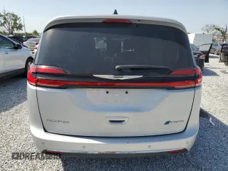 2024 Chrysler Pacifica Hybrid Select with VIN 2C4RC1S7XRR126898, listed as a Copart auction lot 56998225 with 25,971 mi miles and Clean title. Bid and sale history available at DreamBid. Image 6.