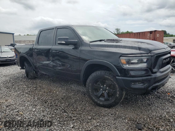 2020 Ram 1500 Rebel with VIN 1C6SRFLT5LN408810, listed as a Copart auction lot 56894725 with 49,089 mi miles and Salvage title. Bid and sale history available at DreamBid. Image 4.