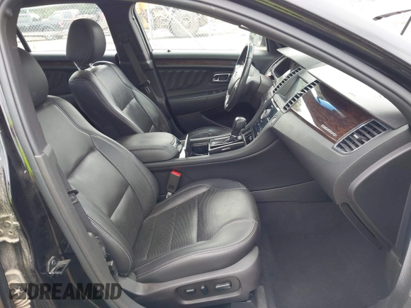 2019 Ford Taurus Limited z VIN 1FAHP2F82KG111088, wystawiony jako IAAI lot #42280384 z przebiegiem 97 961 mil mil oraz . Historia ofert i sprzedaży dostępna na DreamBid. Obrazek 5.