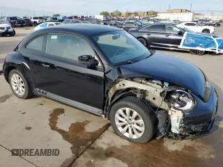2014 Volkswagen Beetle Entry z VIN 3VWF17AT4EM641582, wystawiony jako Copart lot #50631035 z przebiegiem 121 461 mil mil oraz Szkoda całkowita • Salvage title. Historia ofert i sprzedaży dostępna na DreamBid. Obrazek 4.