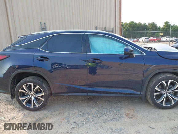 2022 Lexus RX 350 with VIN 2T2HZMAA5NC232352, listed as a IAAI auction lot 42399381 with 13,359 mi miles and . Bid and sale history available at DreamBid. Image 13.