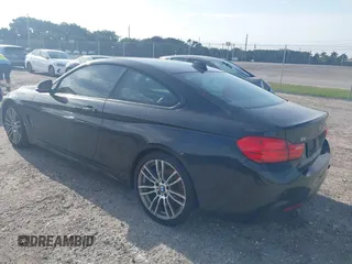 2015 BMW 4 Series 428i with VIN WBA3N3C56FK233866, listed as a IAAI auction lot 41983330 with 218,017 mi miles and . Bid and sale history available at DreamBid. Image 3.