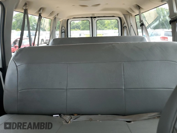 2004 Ford Econoline Passenger XL with VIN 1FBSS31L84HA53604, listed as a Copart auction lot 60685995 with 165,114 mi miles and Clean title. Bid and sale history available at DreamBid. Image 10.