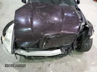 2010 Nissan 370Z Touring с VIN JN1AZ4FH9AM304066, выставлен на аукционе Copart как лот 84176404 с пробегом Не указан миль и На запчасти • Non repairable. История ставок и продаж доступна на DreamBid. Изображение 11.