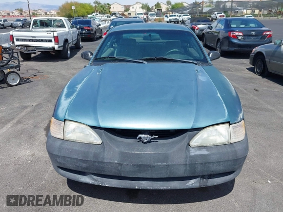1997 Ford Mustang with VIN 1FALP4049VF200422, listed as a IAAI auction lot 42073947 with 157,937 mi miles. Bid and sale history available at carsss.com. Image 13.