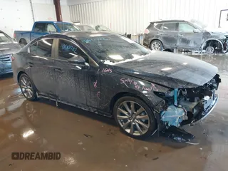 2023 Mazda 3 S Select with VIN 3MZBPABM1PM354902, listed as a IAAI auction lot 41610782 with 13,118 mi miles and . Bid and sale history available at DreamBid. Image 1.