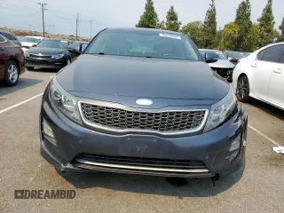 2014 Kia Optima Hybrid EX with VIN KNAGN4AD7E5064844, listed as a Copart auction lot 70834994 with 123,547 mi miles and Salvage Title. Bid and sale history available at carsss.com. Image 5.