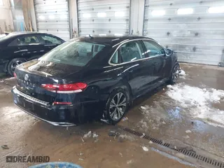 2022 Volkswagen Passat 2.0T SE with VIN 1VWSA7A31NC003418, listed as a IAAI auction lot 41608219 with 76,591 mi miles. Bid and sale history available at carsss.com. Image 4.