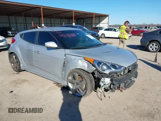 2013 Hyundai Veloster Turbo with VIN KMHTC6AE6DU162372, listed as a IAAI auction lot 41481820 with 105,650 mi miles and . Bid and sale history available at DreamBid. Image 1.