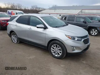 2018 Chevrolet Equinox LT z VIN 3GNAXSEV4JS579267, wystawiony jako IAAI lot #41807039 z przebiegiem 84 162 mil mil oraz . Historia ofert i sprzedaży dostępna na DreamBid. Obrazek 1.
