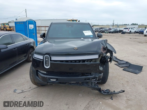 2023 Rivian R1T Adventure with VIN 7FCTGAAA2PN023485, listed as a IAAI auction lot 41227330 with 1 mi miles. Bid and sale history available at carsss.com. Image 12.
