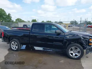 2018 Chevrolet Silverado 1500 Custom with VIN 1GCRCPEC3JZ329430, listed as a IAAI auction lot 42122097 with 199,580 mi miles. Bid and sale history available at carsss.com. Image 13.