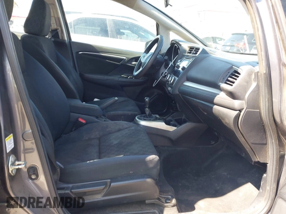 2015 Honda Fit LX with VIN 3HGGK5G54FM731965, listed as a IAAI auction lot 42655355 with 141,205 mi miles and . Bid and sale history available at DreamBid. Image 5.