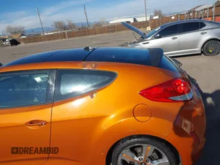 2013 Hyundai Veloster w/Gray Int with VIN KMHTC6AD6DU122025, listed as a IAAI auction lot 41551623 with 189,793 mi miles. Bid and sale history available at carsss.com. Image 6.