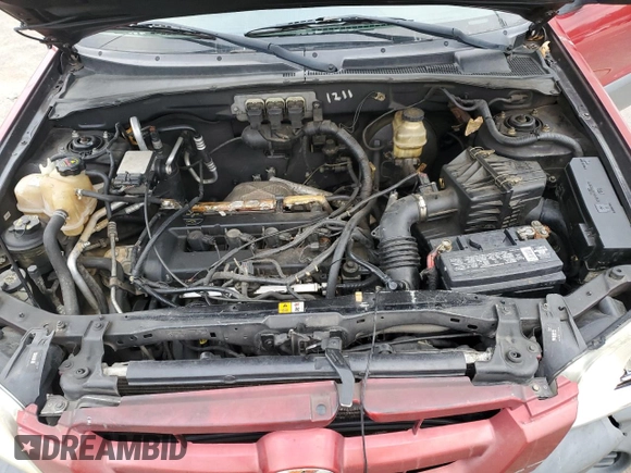 2005 Mazda Tribute i with VIN 4F2YZ02Z55KM63784, listed as a Copart auction lot 82362674 with Not Provided miles and Salvage Title. Bid and sale history available at carsss.com. Image 12.