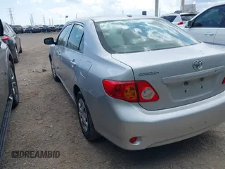2009 Toyota Corolla with VIN JTDBL40E099041319, listed as a IAAI auction lot 42119698 with 205,666 mi miles. Bid and sale history available at carsss.com. Image 3.
