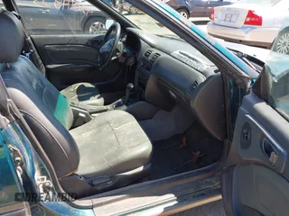 1996 Subaru Legacy Outback z VIN 4S3BG6854T7980058, wystawiony jako IAAI lot #42641853 z przebiegiem 291 685 mil mil oraz . Historia ofert i sprzedaży dostępna na DreamBid. Obrazek 5.