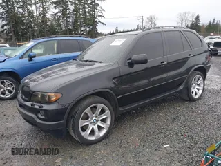 2005 BMW X5 4.8is with VIN 5UXFA93515LE82570, listed as a IAAI auction lot 41759657 with 212,687 mi miles. Bid and sale history available at carsss.com. Image 17.