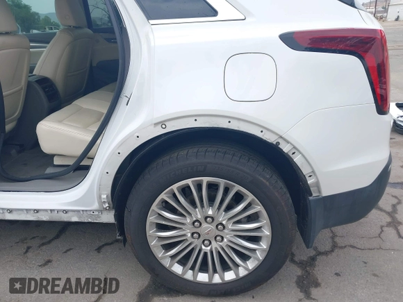 2017 Cadillac XT5 Premium Luxury FWD with VIN 1GYKNCRS4HZ128145, listed as a IAAI auction lot 42349980 with 99,100 mi miles and . Bid and sale history available at DreamBid. Image 19.