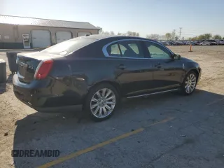 2011 Lincoln MKS z VIN 1LNHL9DR1BG607036, wystawiony jako Copart lot #53512305 z przebiegiem 159 921 mil mil oraz Szkoda całkowita • Salvage title. Historia ofert i sprzedaży dostępna na DreamBid. Obrazek 3.
