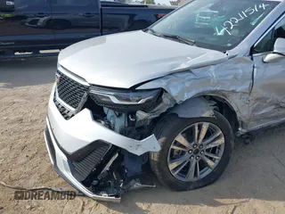2020 Cadillac XT6 FWD Premium Luxury z VIN 1GYKPCRSXLZ136057, wystawiony jako IAAI lot #42211514 z przebiegiem 32 476 mil mil oraz . Historia ofert i sprzedaży dostępna na DreamBid. Obrazek 6.
