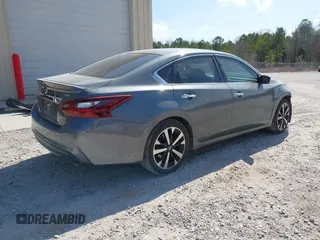 2018 Nissan Altima SR with VIN 1N4AL3AP6JC118424, listed as a IAAI auction lot 41697348 with 112,910 mi miles and . Bid and sale history available at carsss.com. Image 4.