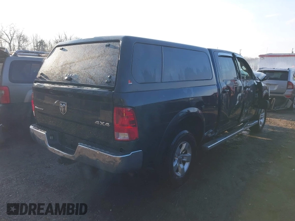 2015 Ram 1500 Big Horn with VIN 1C6RR7TM7FS569176, listed as a IAAI auction lot 41474950 with 220,742 mi miles and . Bid and sale history available at DreamBid. Image 4.