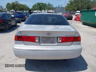 2000 Toyota Camry CE z VIN 4T1BG22K5YU972322, wystawiony jako IAAI lot #42098429 z przebiegiem 122 351 mil mil oraz . Historia ofert i sprzedaży dostępna na DreamBid. Obrazek 16.