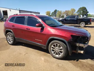 2019 Jeep Cherokee Latitude Plus with VIN 1C4PJLLB0KD128647, listed as a Copart auction lot 50322885 with 125,195 mi miles and Salvage Title. Bid and sale history available at carsss.com. Image 4.