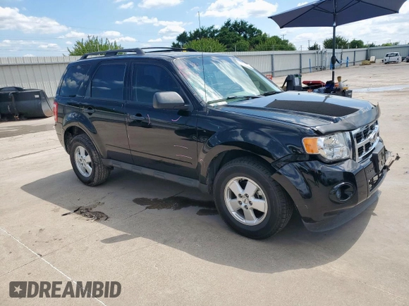 2012 Ford Escape XLS with VIN 1FMCU0C7XCKC81240, listed as a Copart auction lot 60207255 with 82,443 mi miles and Salvage title. Bid and sale history available at DreamBid. Image 4.
