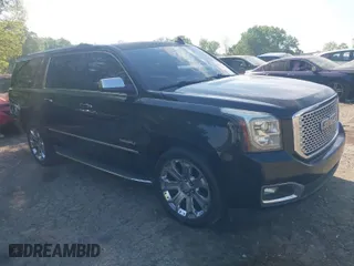 2015 GMC Yukon XL Denali with VIN 1GKS1JKJ5FR653076, listed as a IAAI auction lot 42072132 with 288,568 mi miles. Bid and sale history available at carsss.com. Image 1.