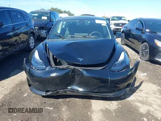 2023 Tesla Model 3 with VIN 5YJ3E1EA2PF482536, listed as a IAAI auction lot 41858110 with 6,298 mi miles. Bid and sale history available at carsss.com. Image 6.