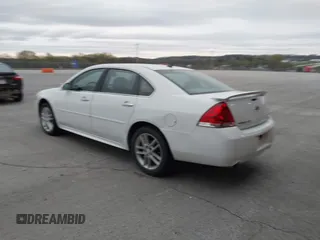 2013 Chevrolet Impala LTZ with VIN 2G1WC5E37D1223897, listed as a IAAI auction lot 41950823 with 165,237 mi miles and . Bid and sale history available at DreamBid. Image 3.