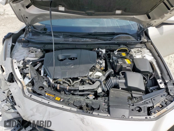 2024 Mazda 3 S Preferred with VIN JM1BPALM5R1721303, listed as a Copart auction lot 52949115 with 4,557 mi miles and Salvage title. Bid and sale history available at DreamBid. Image 12.