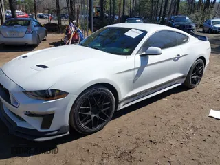 2019 Ford Mustang EcoBoost with VIN 1FA6P8TH7K5200827, listed as a IAAI auction lot 41652020 with 57,053 mi miles and . Bid and sale history available at carsss.com. Image 18.