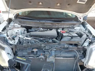 2016 Nissan Rogue S with VIN 5N1AT2MM5GC883358, listed as a IAAI auction lot 41671158 with 106,890 mi miles. Bid and sale history available at carsss.com. Image 10.