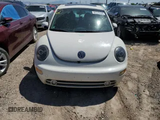 2001 Volkswagen Beetle GLX z VIN 3VWDD21C71M435250, wystawiony jako Copart lot #65546334 z przebiegiem 189 542 mil mil oraz Szkoda całkowita • Salvage title. Historia ofert i sprzedaży dostępna na DreamBid. Obrazek 5.