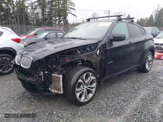 2014 BMW X6 50i with VIN 5UXFG8C57EL593257, listed as a IAAI auction lot 41655486 with 128,292 mi miles. Bid and sale history available at carsss.com. Image 19.