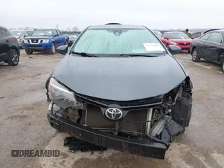 2018 Toyota Corolla L z VIN 5YFBURHE7JP831763, wystawiony jako IAAI lot #41539485 z przebiegiem 95 495 mil mil oraz . Historia ofert i sprzedaży dostępna na DreamBid. Obrazek 13.