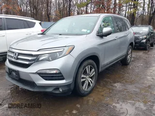 2017 Honda Pilot EX-L with VIN 5FNYF6H51HB069068, listed as a IAAI auction lot 41567728 with 100,618 mi miles and . Bid and sale history available at DreamBid. Image 17.