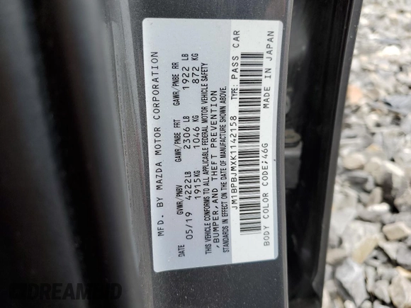 2019 Mazda 3 with VIN JM1BPBJMXK1142158, listed as a Copart auction lot 59874944 with 60,256 mi miles and Salvage title. Bid and sale history available at DreamBid. Image 12.