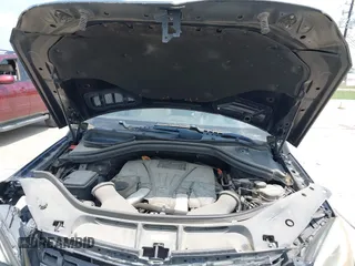 2014 Mercedes-Benz M with VIN 4JGDA7DBXEA291980, listed as a IAAI auction lot 42161942 with 121,341 mi miles. Bid and sale history available at carsss.com. Image 10.