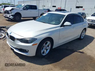 2012 BMW 3 Series 328i with VIN WBA3A5C51CF349987, listed as a IAAI auction lot 42013599 with 256,461 mi miles. Bid and sale history available at carsss.com. Image 18.