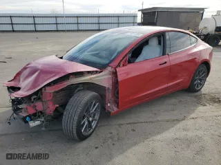 2022 Tesla Model 3 with VIN 5YJ3E1EA8NF138223, listed as a Copart auction lot 77071294 with 66,976 mi miles and Salvage Title. Bid and sale history available at carsss.com. Image 1.