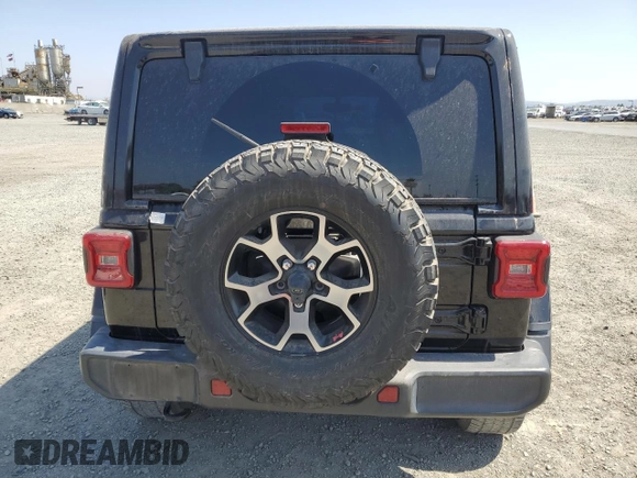 2018 Jeep Wrangler Unlimited Rubicon with VIN 1C4HJXFG1JW125326, listed as a Copart auction lot 62655395 with 33,920 mi miles and Clean title. Bid and sale history available at DreamBid. Image 6.